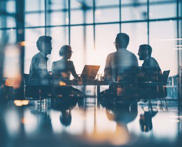 Corporate people working together in the conference room of their office, sharing idea and planning the business strategy of their company - Teamwork and brainstorming abstract concept. High quality